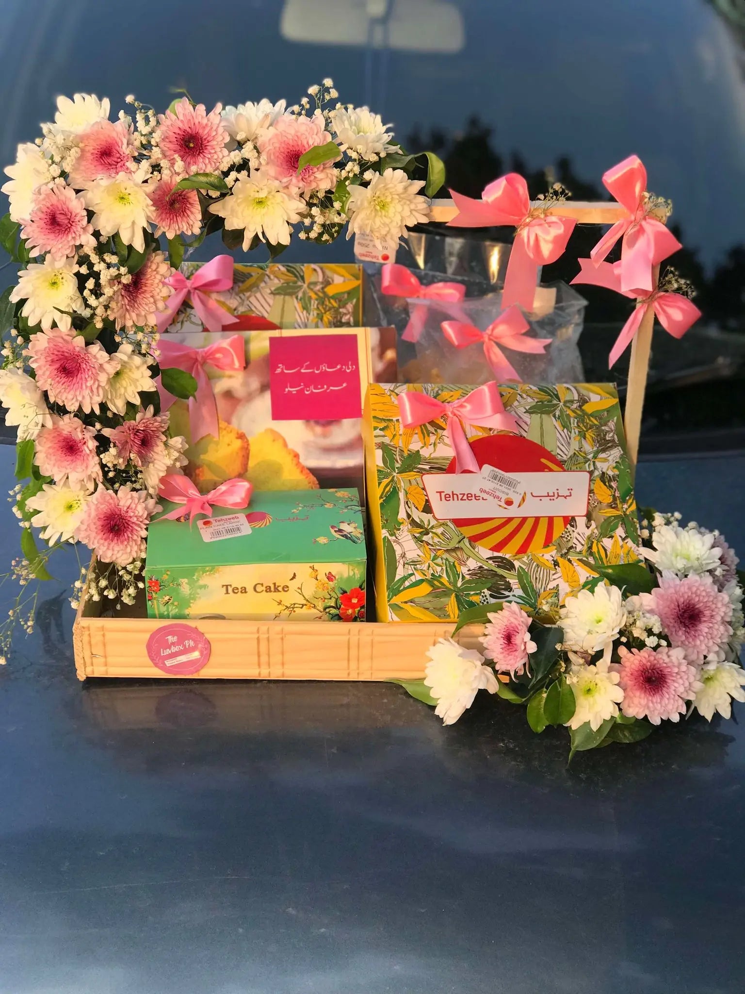 Elegant Treats – Wooden Tray with Tehzeeb Snacks & Floral Decor