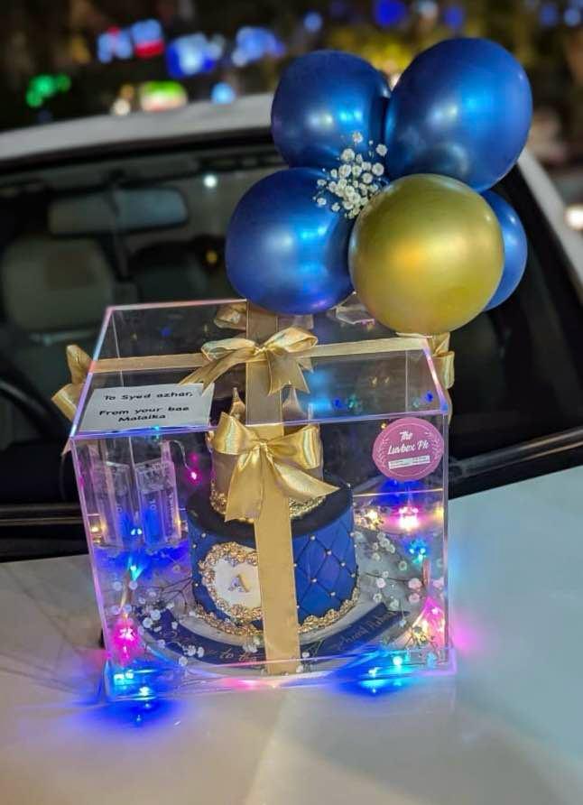 For Him β Premium 3-4 Lbs Customized Cake in Acrylic Box with Balloons & Lights