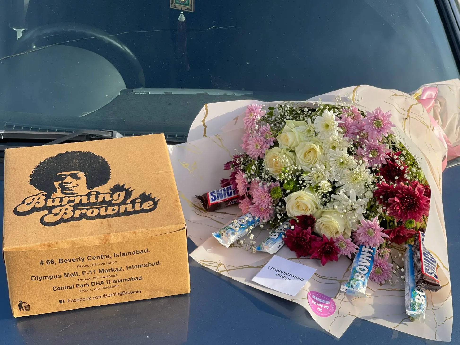 Mixed flower and chocolate bouquet with burning brownie cake – The LuvBox PK Islamabad