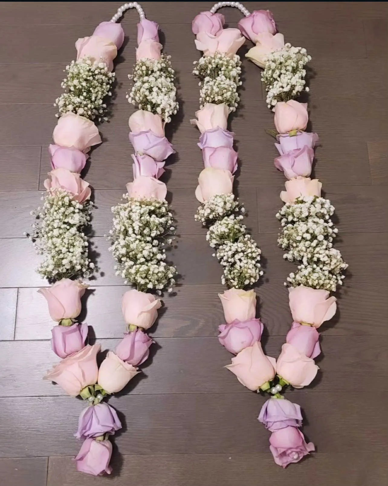 Gorgeous garland with imported pink roses and baby’s breath