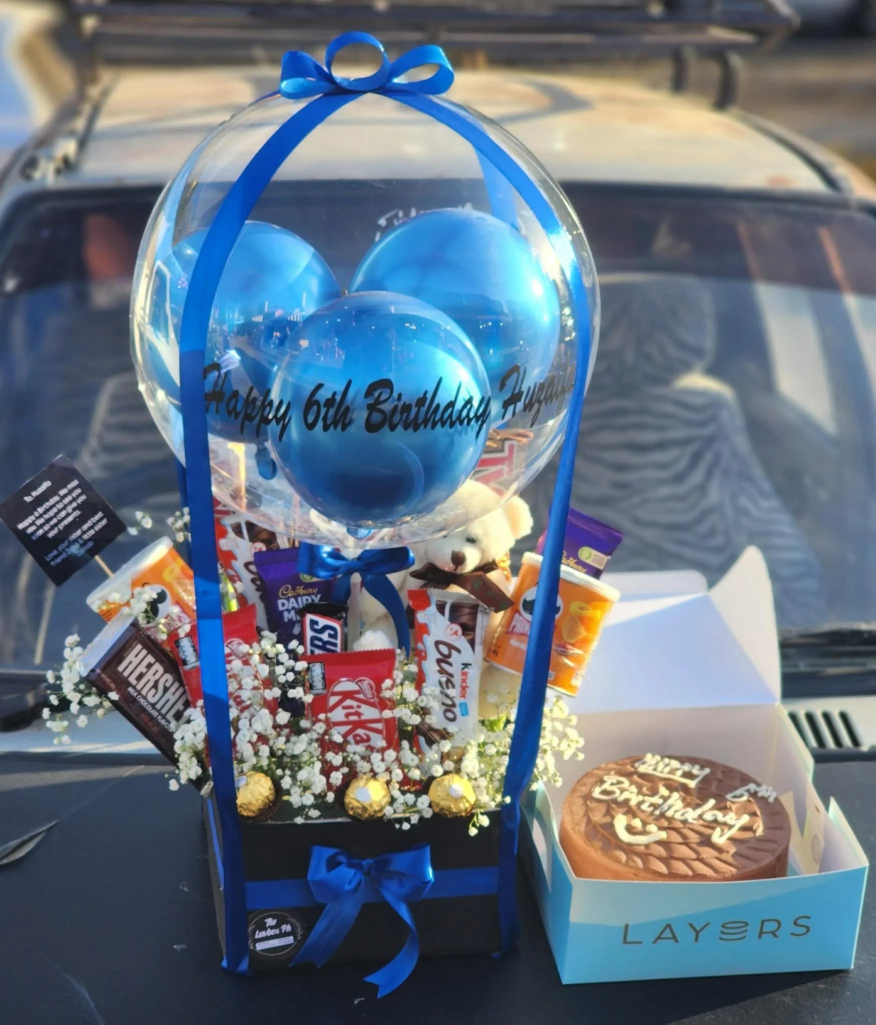 Blue themed birthday balloon box with 2.5 lbs cake combo gift for him Islamabad