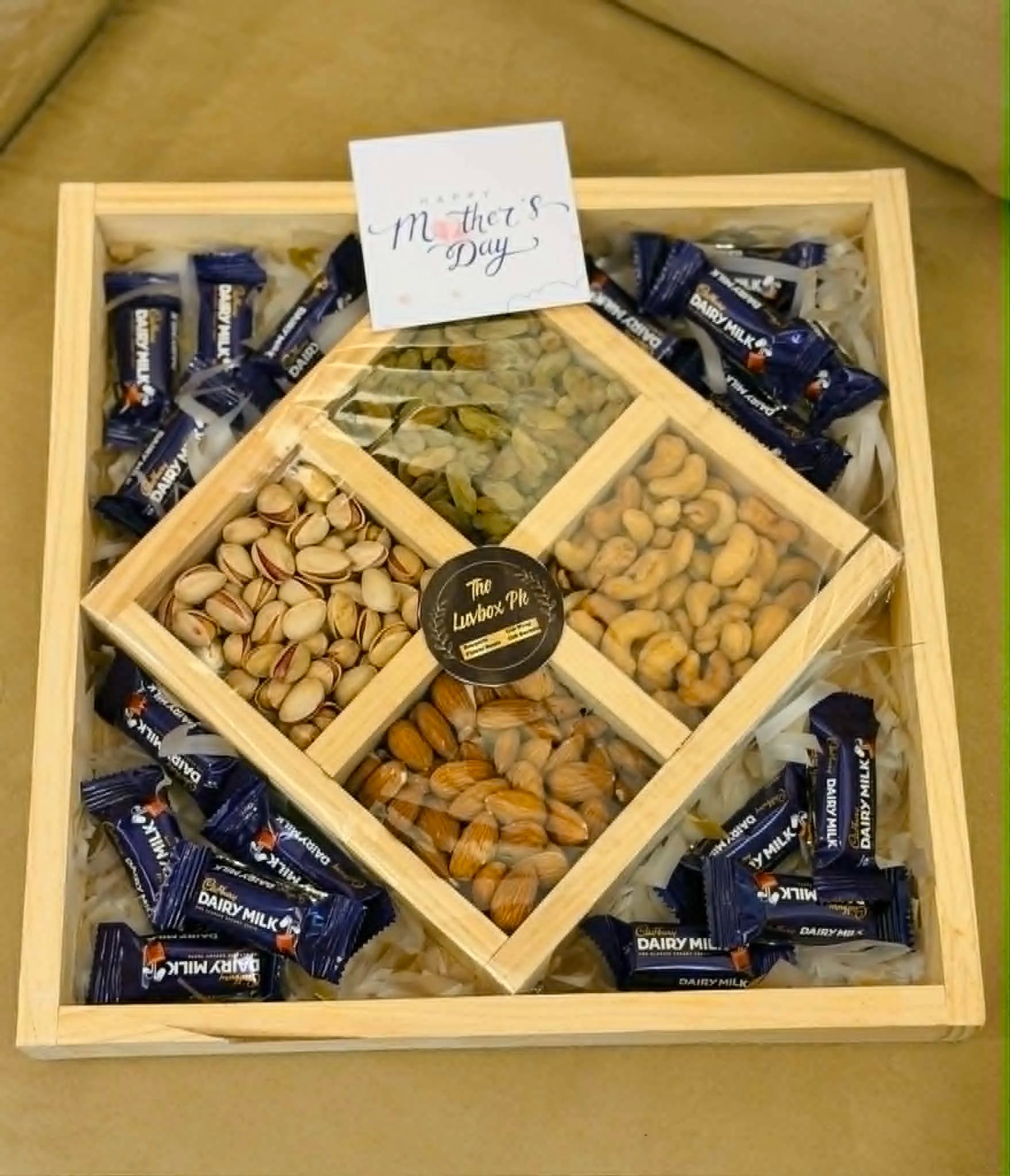 Wooden tray with dry fruits and chocolate sides partition premium gift delivery Islamabad Pakistan