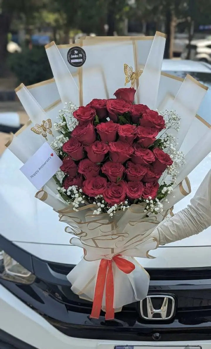 Elegant bouquet of 30 long-stem roses wrapped beautifully