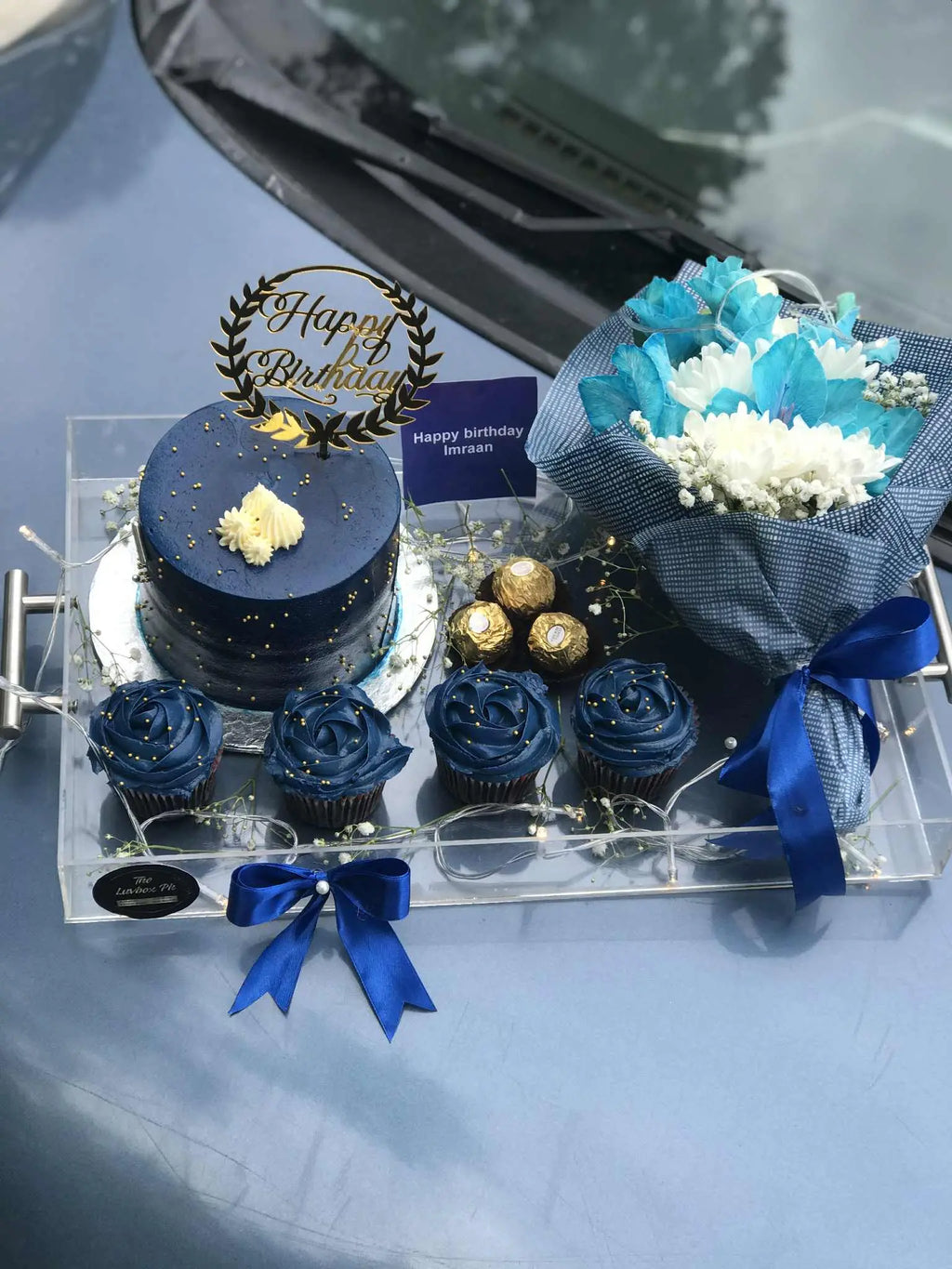 Father’s Day acrylic gift tray with cake, cupcakes, Ferrero Rocher, and mini flower bouquet by The LuvBox PK