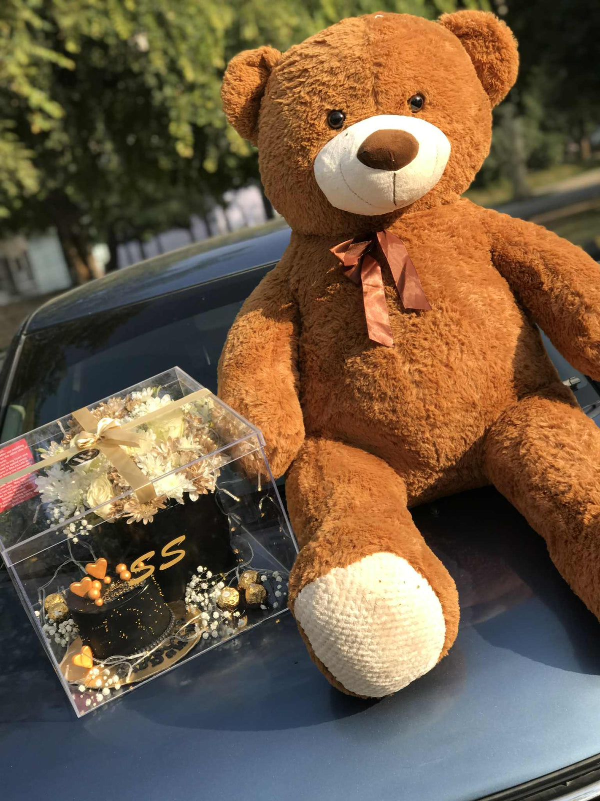 Grande Amour luxury birthday set with acrylic box cake, flowers, and giant teddy bear
