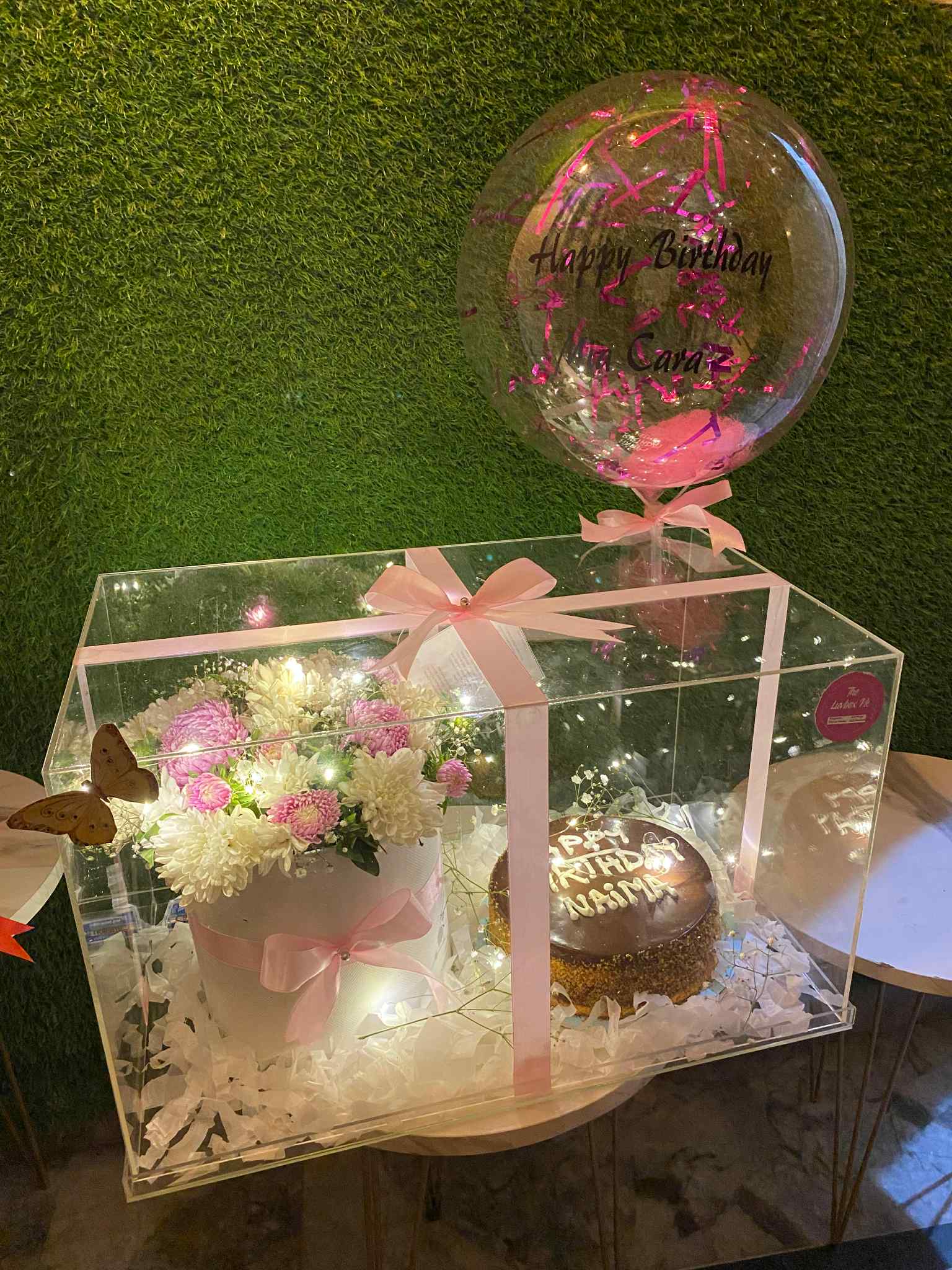 Luxury acrylic box with cake, flowers, LED lights and custom balloon – gift shop in Islamabad
