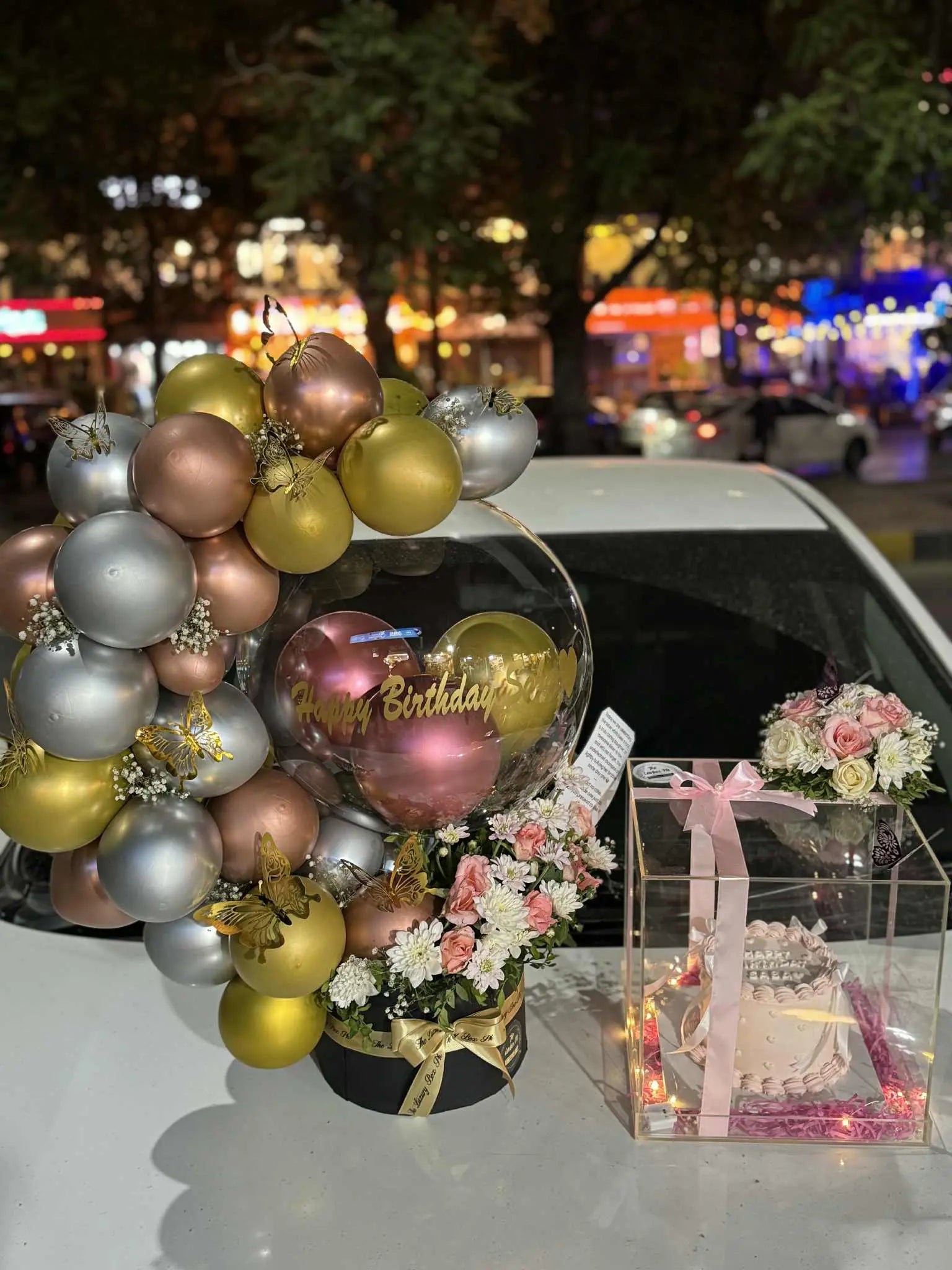 Luxury gift combo for her with balloon arch and customized cake in acrylic box – gift shop Islamabad