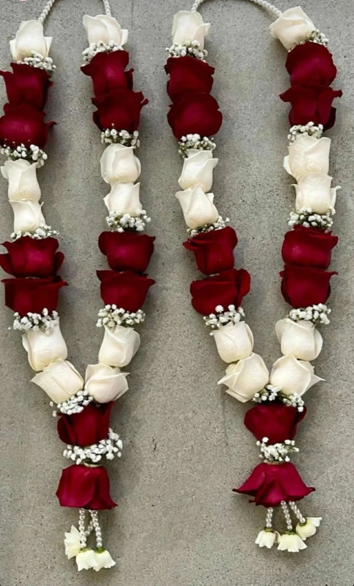 Luxury rose garland floral jewelry for bride and groom – premium wedding garland in Pakistan.