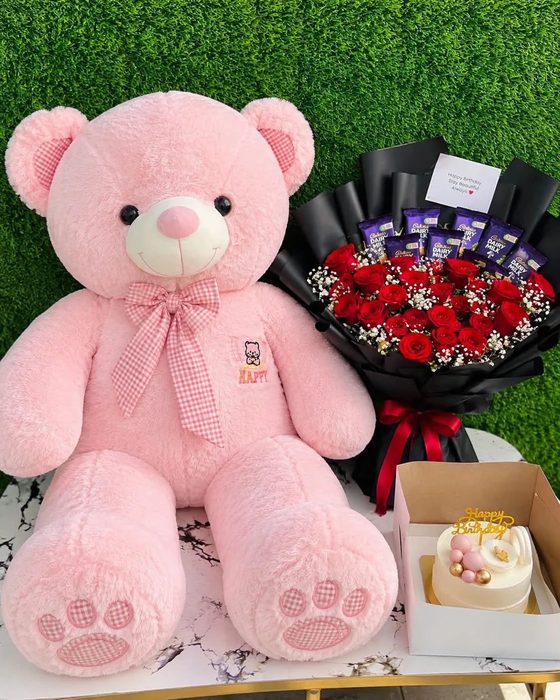 3 feet pink teddy bear with 3 lbs custom chocolate fudge cake red roses and Dairy Milk chocolate bouquet Islamabad