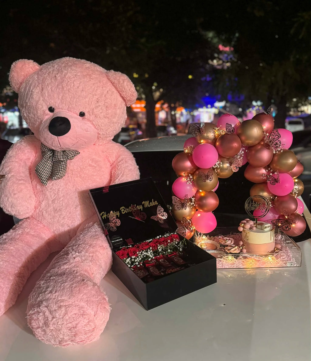 Ultra luxury pink celebration combo with 6 feet teddy acrylic tray balloon arch cake cupcakes and chocolates from gift shop Islamabad
