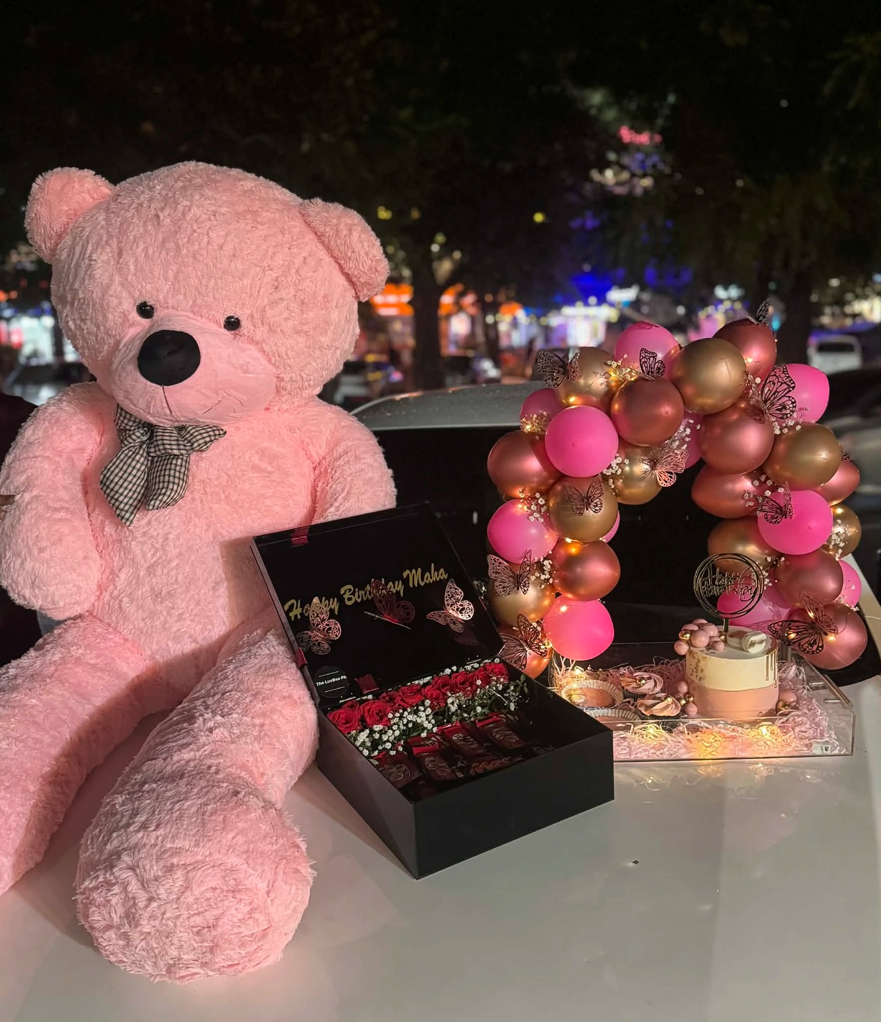 Ultra luxury pink celebration combo with 6 feet teddy acrylic tray balloon arch cake cupcakes and chocolates from gift shop Islamabad
