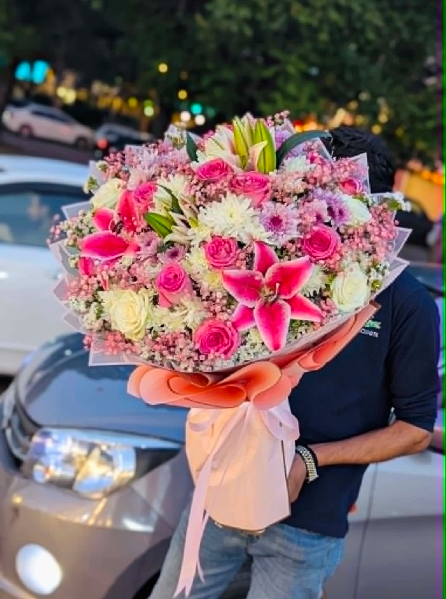 XXL luxury pink and white floral bouquet with lilies, roses, chrysanthemums, and baby's breath for birthdays, anniversaries, and flower delivery in Pakistan.