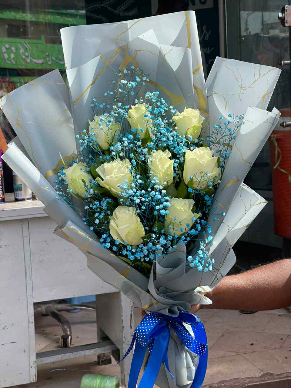 Royal Serenity bouquet – elegant white roses in royal blue wrap, perfect gift for him