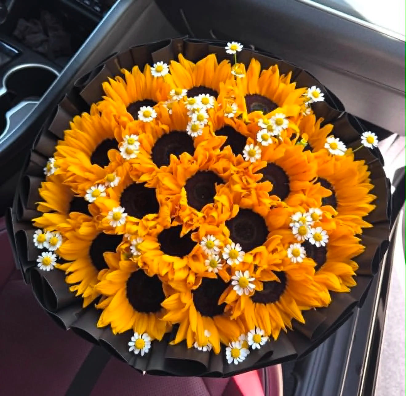 Oversized birthday bouquet with 30 fresh sunflowers and white Baby’s Breath, beautifully arranged as a special birthday gift for her in Islamabad.