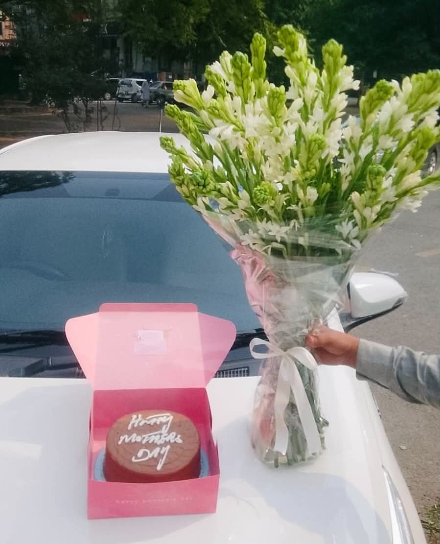 Elegant birthday combo with fresh fragrant tuberose bouquet and 2.5 lbs layered cake for birthdays and special occasion delivery in Pakistan.
