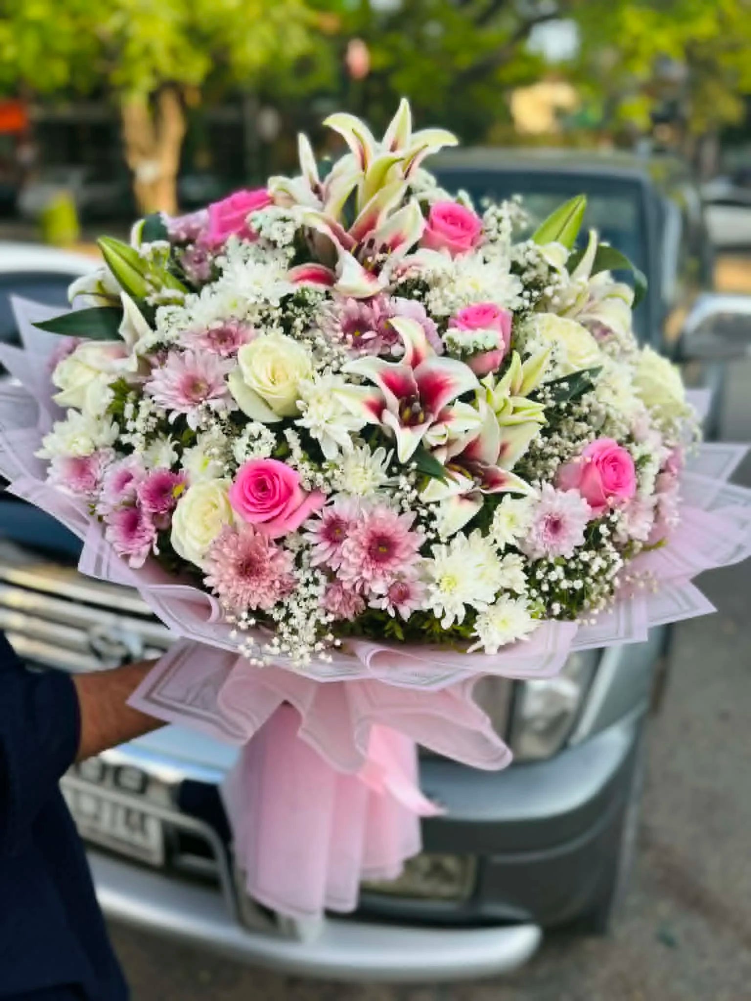 XXL oversized pink bouquet with lilies, roses and chrysanthemums for luxury gifting.